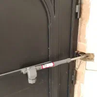 تعمیر انواع جک درب پارکینگ