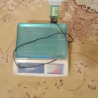 ترازو و میز تلویزیون