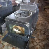 بخاری هیزمی ورق دومیل درب شیشه نسوز  ازتولیدی بگیر