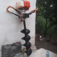 دستگاه علف زن و چاله کن