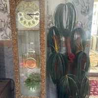 ساعت ایستاده و گل