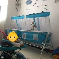 تخت گهواره ای کنار مادر