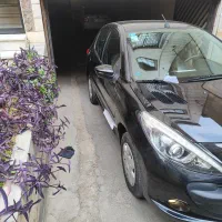 دستگاه 207 مشکی  سقف فلز مدل1402 درحدصفر ...