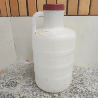 دبه خیارشوری و شیشه رب و ترشی