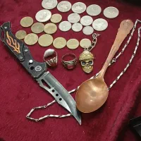 تعدادی سکه و قاشق مس انگشتر چاقو...