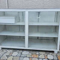 ویترین۲عدد،یک عدد گاز رو میزی وسایل قلعه تل هستن|بوفه، ویترین، کنسول|باغ ملک, |دیوار