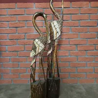 مجسمه چوبی لک لک