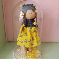 عروسک بهمراه گوی