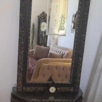 آینه وکنسول وساعت ایستاده