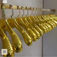 فروش چوب لباسی آبکاری طلایی وارداتی
