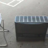 بخاری گازی و صندلی غذای کودک