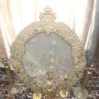 اینه.وشمعدان