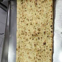 فروشنده نانوایی (خانم)