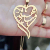 مهناز ومیلاد پلاک طلا