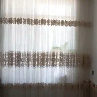 دو پرده توری طرح دار با کتیبه و زیر پرده