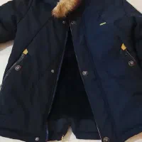 کاپشن|لباس|الیگودرز, |دیوار