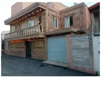 ساختمان300متربنا-2طبقه-با-خرپشتی-بزرگ