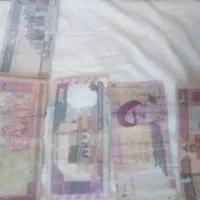 تعدای اسکناس و سکه زمان شاهی