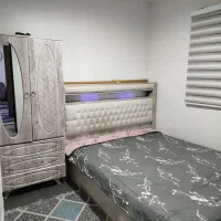 تخت خواب و کمد
