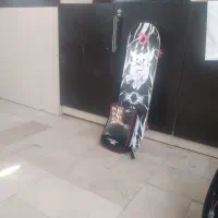 اسکیت بورد و راکت پینگ پنگ