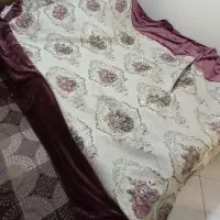 پرده مخمل بنفش با طرح گل برجسته جنس پرده ترک