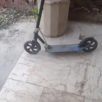 اسکوتر چرخ بزرگ فلزی برابر با تصاویر و توضیح