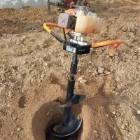 خدمات باغبانی . کاشت نهال وگل وگیاه با دستگاه..