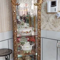 بوفه طلایی چدن وبرنجی طلایی سلطنتی4طبقه چراغ دار