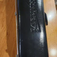 کیس کمانچه (رهاوی)|سازهای سنتی|تهران, فلسطین (میدان انقلاب)|دیوار