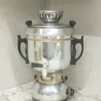 سماور گازی۶لیتری و رخت آویزلعابی۶۰سانتی