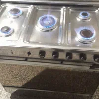 اجاق گاز  فر دار تمام استیل در حد نو