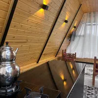 کلبه سوئیسی جنگلی|اجارهٔ کوتاهمدت ویلا و باغ|لاهیجان, آهندان|دیوار