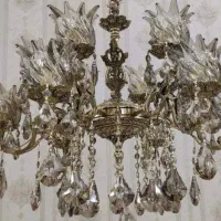 یک عدد لوستر برنجی نو