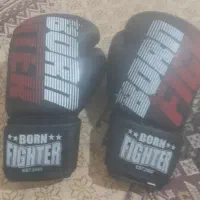 دستکش بوکس نونو هستش فقط سه بار استفاده شده