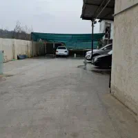 کارگر کارواش با جای خواب