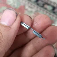 دو عدد دکمه گوشی و رابط مموری با گوشی