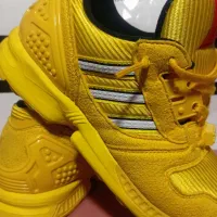 کتونی اورجینال لگو زرد سایز 38