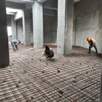 بتن ریزی کف با ماله پروانه سرنشین دار