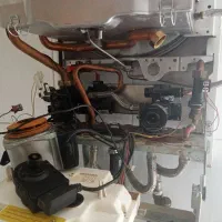 تعمیرات پکیج و رادیاتور های سوراخ|خدمات پیشه و مهارت|پرند, فاز ۵|دیوار