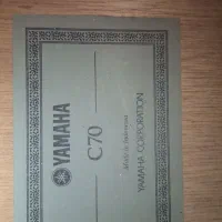 گیتار یاماها C70 کاملاً نو و سالم با کیس و استند