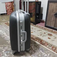 چمدان سایز متوسط فایبرگلاس چرخها۳۶۰درجه ودسته ریلی