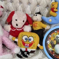 عروسک وساعت بچگانه