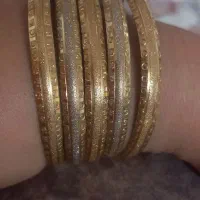 النگو طلا یک عدد۱۰۰بالای تابلو