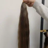 خریدار موی طبیعی بلند و بور طلائی