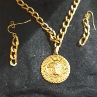 گردنبندو گوشواره استیل ورساچ نو