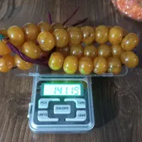 تسبیح کهربا رگه دار