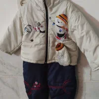 کیف وکالسکه و تعدادی لباس بچه گانه