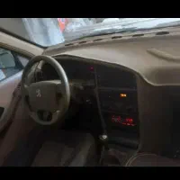 پژو 405 نقره ای مدل 90 تکسوز