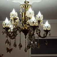 لوستر ۱۰ شاخه تمام برنز با طرح فرشته در حد نو