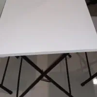 میز و دو عدد صندلی تاشو